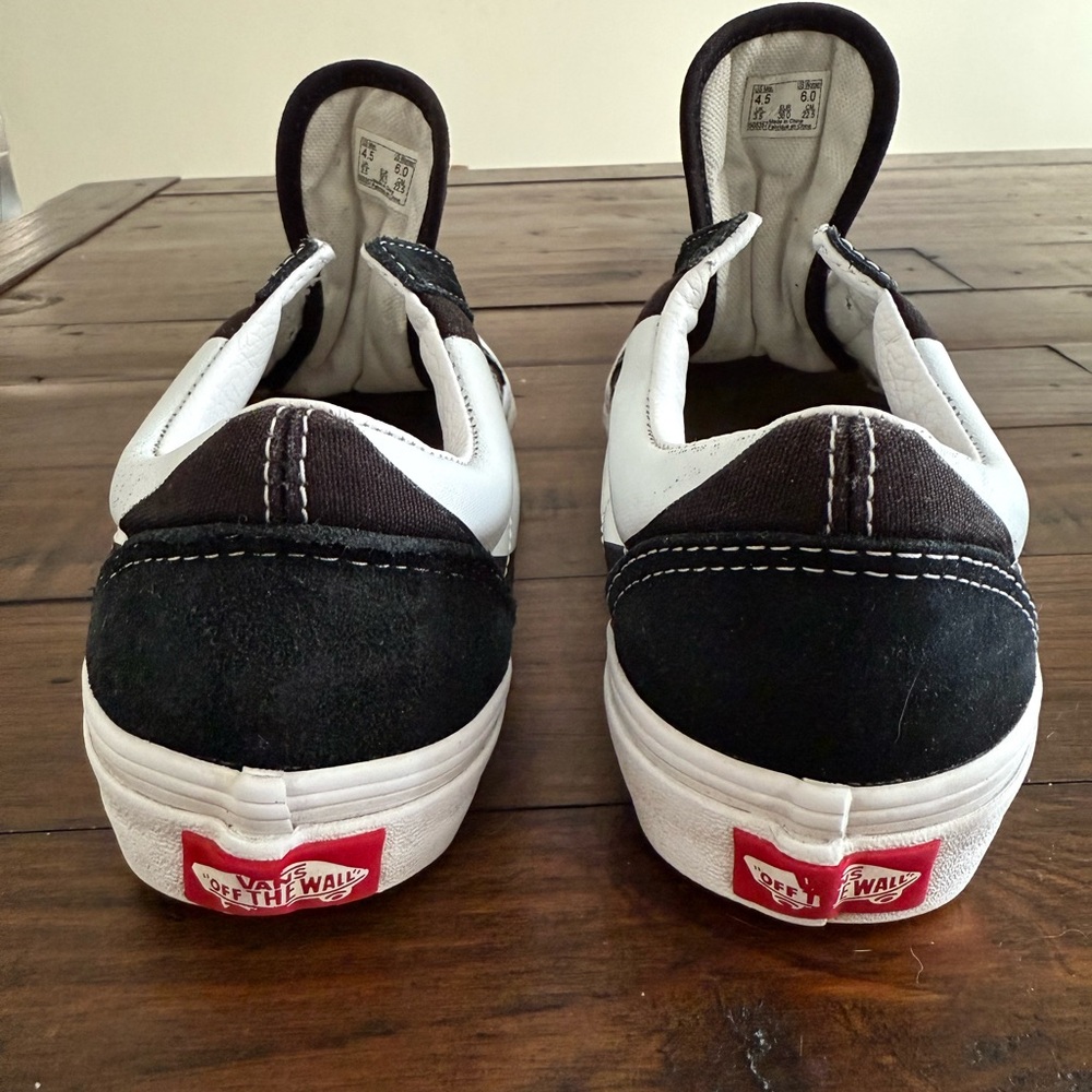 Vans Black and White Slip-On Sneakers